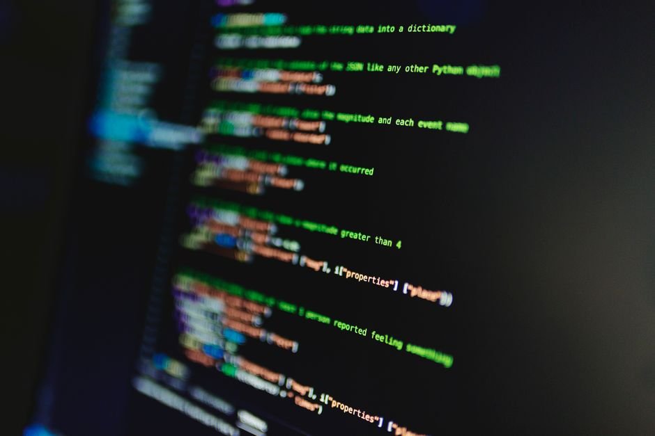 Colorful lines of code on a computer screen showcasing programming and technology focus.