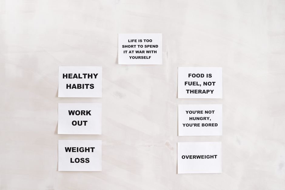 Minimalist display of motivational health and wellness quotes emphasizing healthy habits and weight management.