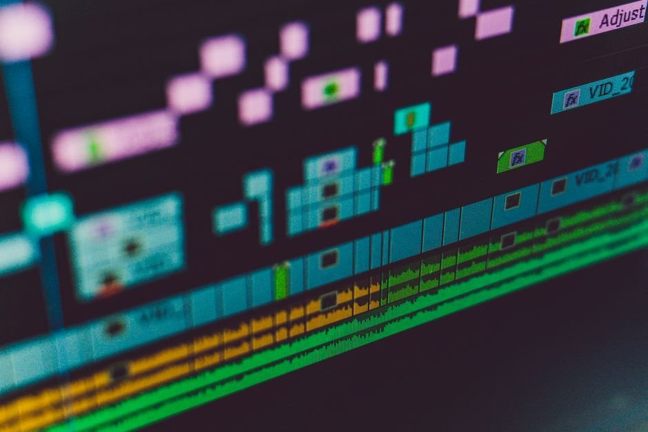 Detailed view of a video editing software interface showing multi-track timeline and colorful design.